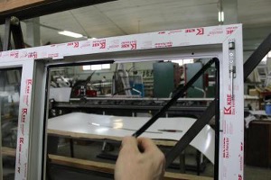 The rubber band is placed on the frame