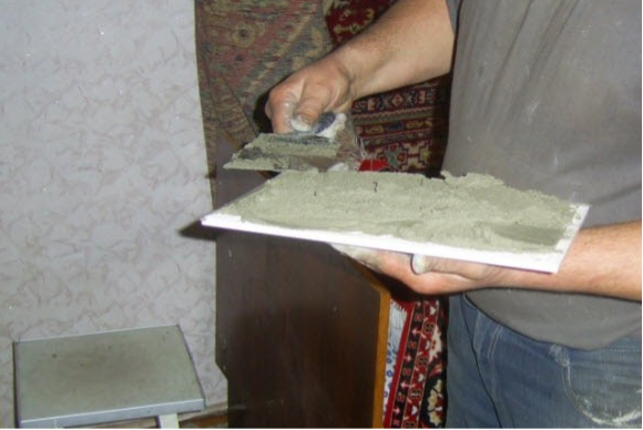 Laying tiles on the stove
