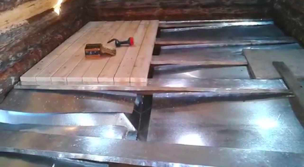 Floor in the steam room of a frame bath