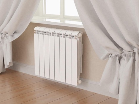 How to hang a heating radiator on brackets